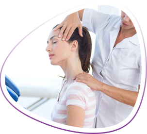 Massage therapist places hands on neck of seated client