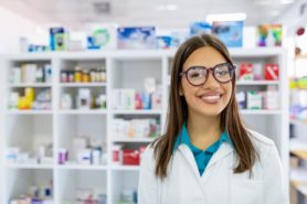 Smiling pharmacy technician 
