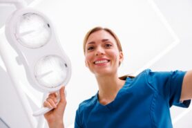 Traveling dental assistant on the job in new location 