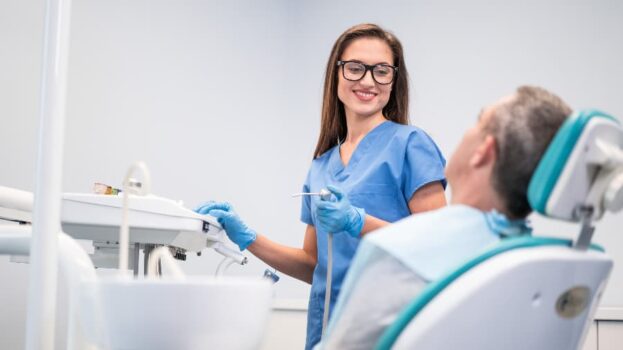 Patient having teeth examined at dentist